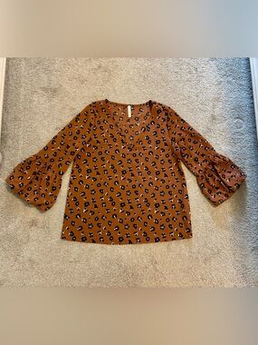Women’s Small MTS Rust Animal Print V-Neck Blouse